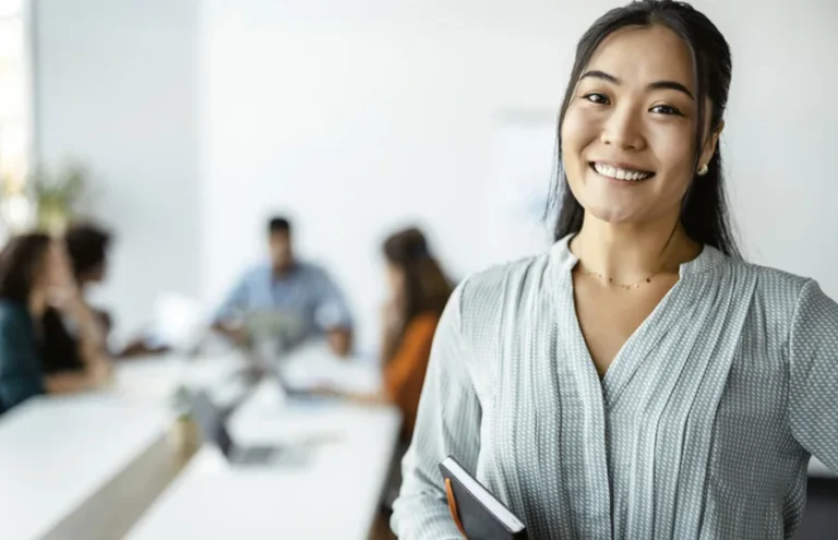 Smiling Utah mortgage loan officer in an office