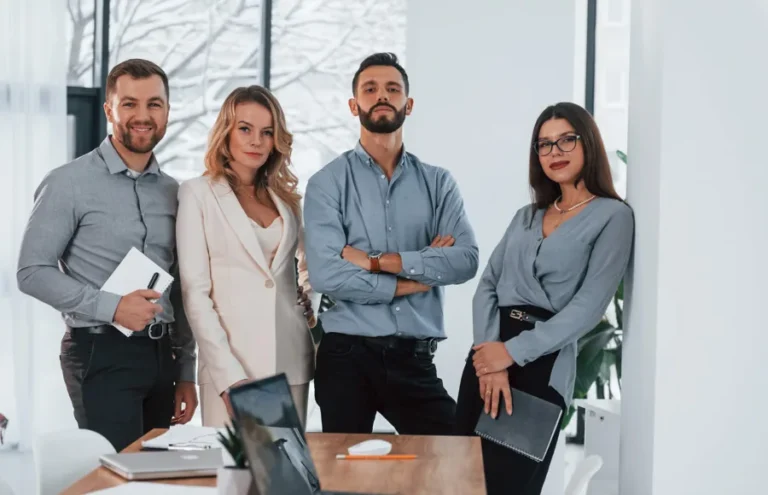 Team of Utah Realtors in a bright office